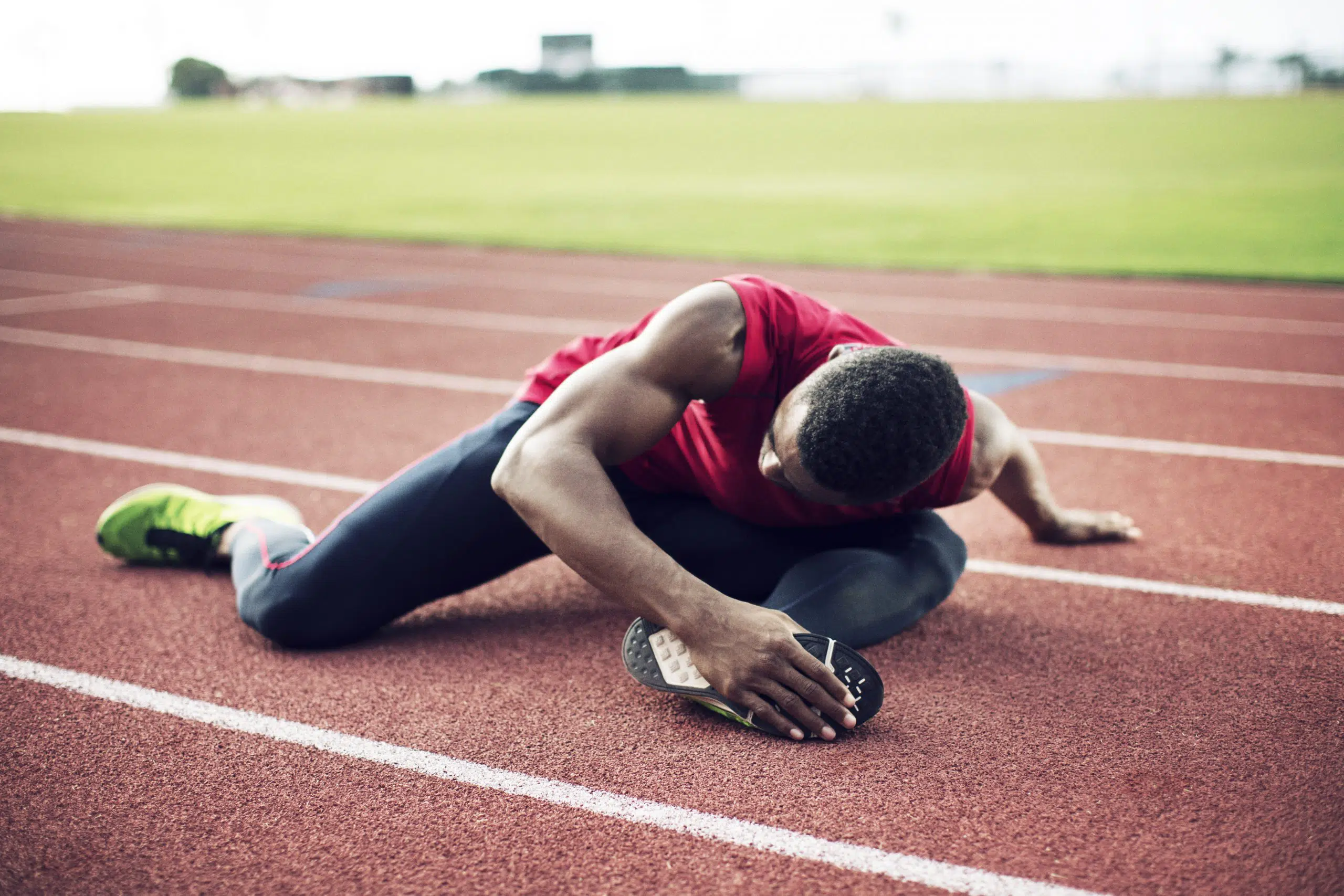 male athlete exercising on running tracks 2022 03 09 02 12 21 utc scaled